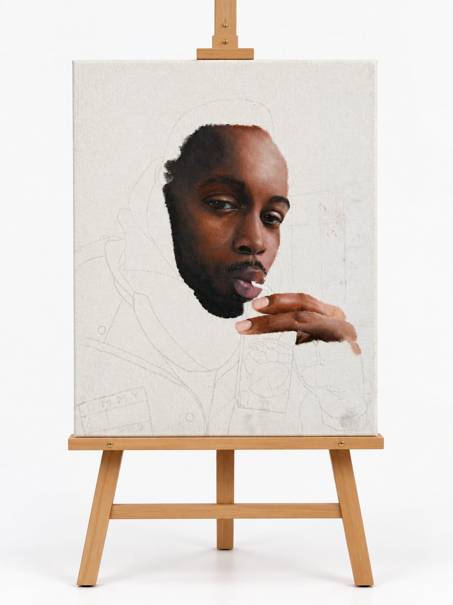 A half-finished portrait painting in progress on an easel