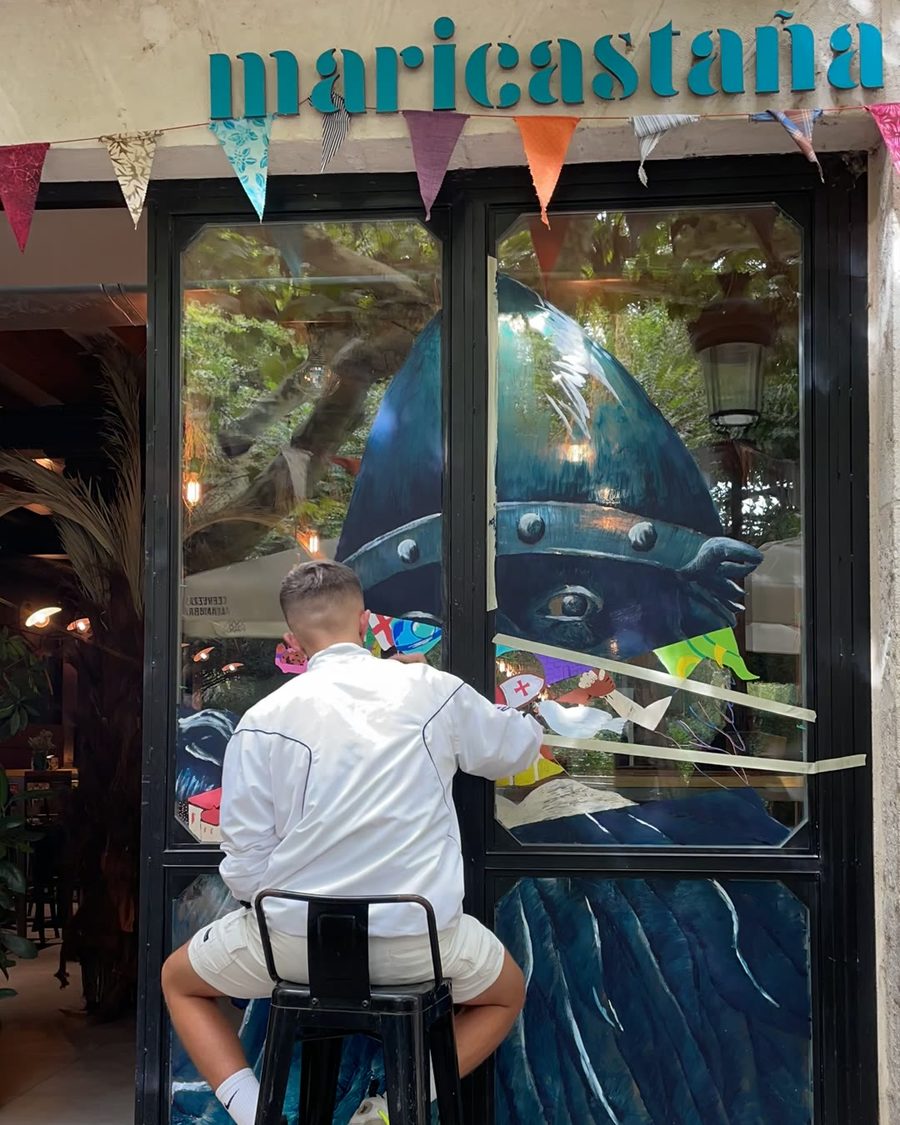 Mural painted on a restaurant's glass entrance doors